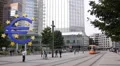 Modern Tram Passing Famous German City Symbol Euro Sign Frankfurt People Walking HD Footage