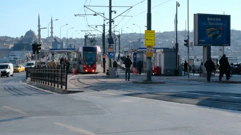 Modern trams on the move at Karakoy Square in Istanbul. Stock Footage 130496202