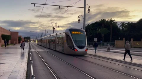 Modern tramway passing on the road in Rabat, Morocco Stock Footage 231157540