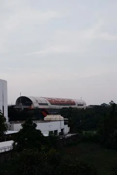 Modern Transit Hub Featuring Elevated LRT Structure and Skyscrapers Foto stock