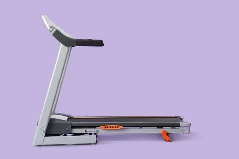 Modern treadmill on lilac background Stock Photos