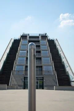 Modern triangular building against blue sky 写真素材