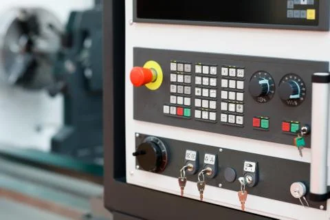 Modern turning machine with CNC control panel Stock Photos