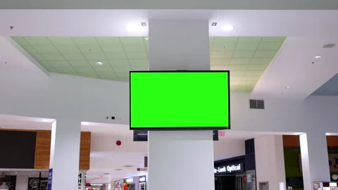 Modern TV with a green screen point of view inside food court area Video stock 85833907