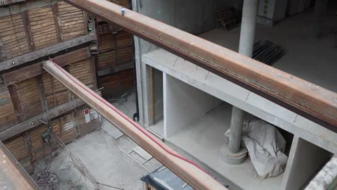Modern underground building foundation with exposed concrete walls steel support Stock Footage 309654497