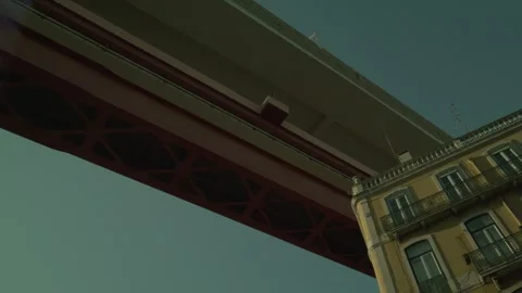 Modern Urban Scene Under the 25 de Abril Bridge in LX Factory, Lisbon Stock Footage 273789953