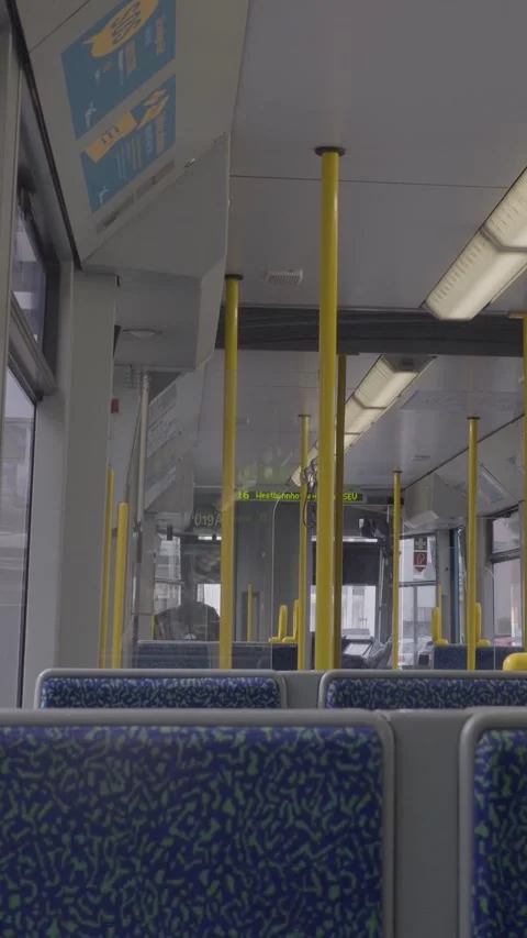Modern Urban Train Interior in Vertical Format Under Daylight Stock Footage 316708871