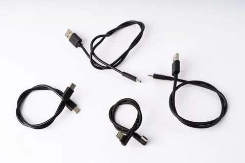 Modern USB Charging and Data Cables Collection Stock Photos