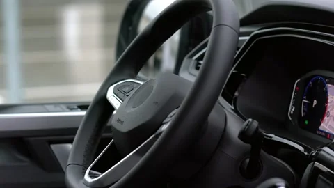 Modern van interior with steering wheel and dashboard Stock Footage 144688215