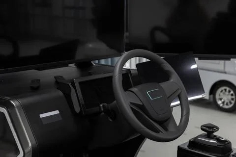 Modern vehicle simulator system, close-up of a steering wheel Stock Photos