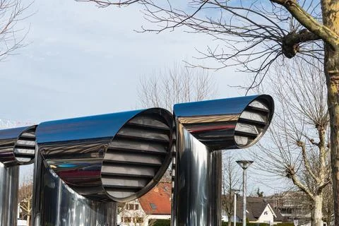 Modern ventilation system in a public space near residential buildings Stock Photos