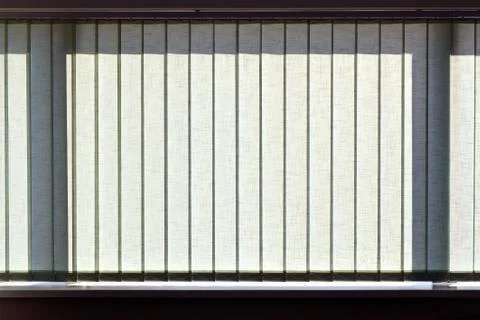 Modern vertical blinds on the window Stock Photos