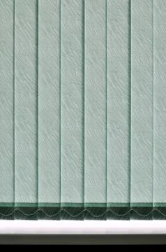 Modern vertical blinds on the window Stock Photos