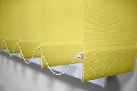 Modern vertical blinds on the window. Stock Photos