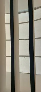 Modern Vertical Window Blinds with Soft Light and Shadow 스톡 사진