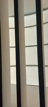 Modern Vertical Window Blinds with Soft Light and Shadow Stock Photos