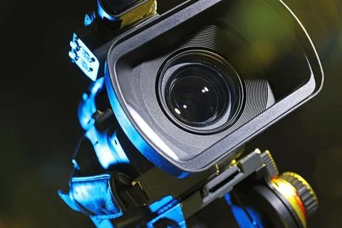 Modern video camera on black background, closeup Stock Photos