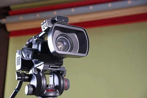 Modern video camera in stylish studio, low angle view. Space for text Fotos de archivo