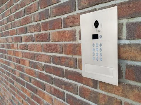 Modern Video Intercom Mounted on Brick Wall Stock Photos