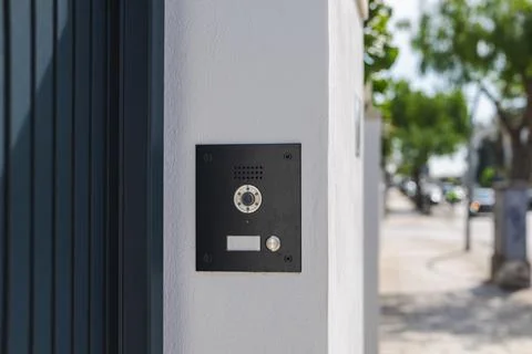Modern video intercom system installed on residential building entrance Stock Photos