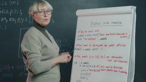 Modern vlogger recording tutorial about software language teaching online Stock Footage 205854794