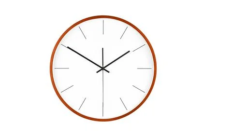Modern wall clock with minimalist design featuring clean white face Stock Photos
