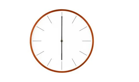 Modern wall clock with minimalist design featuring clean white face 6 hour Stock Photos