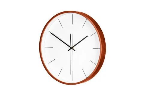 Modern wall clock with minimalist design featuring clean white face Stock Photos