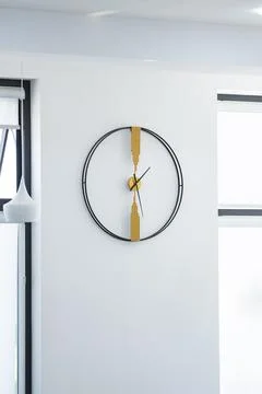 Modern Wall Clock in Minimalist Interior with Large Windows Stock Photos