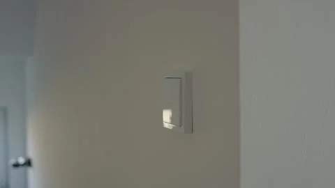 Modern Wall Lamp Glowing Warm Light, Bright Interior Detail, Close Up Shot 動画素材 341570062