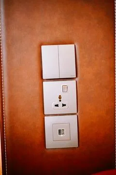 Modern Wall Panel with Electrical Outlets and USB Charging Ports Foto stock