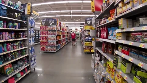 Modern Walmart grocery store interior customer in distance shopping Stock Footage 184608476