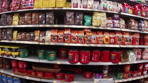 Modern Walmart grocery store interior pan coffee section Stock Footage 184608957