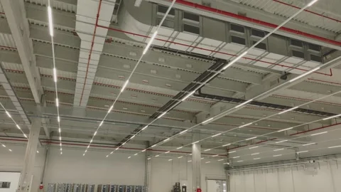 Modern warehouse interior view featuring industrial ceiling construction wi.. Stock Footage 337599124