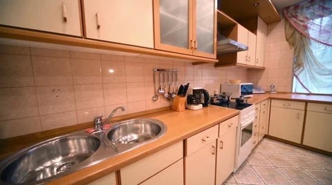 Modern wash and table in empty kitchen in apartment Video stock 42754319