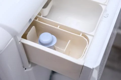 A modern washing machine empty clean drawer, a washer container for detergent Stock Photos