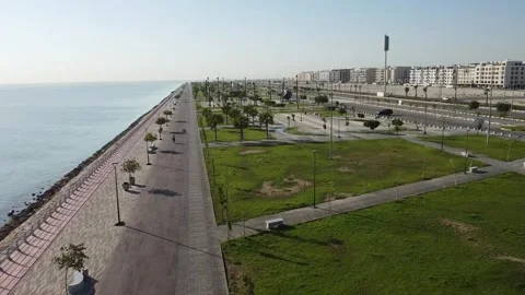 Modern Waterfront with bicycle pathway, ocean Views Stock Footage 333592090
