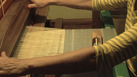 Modern weaver using an antique loom. Stock Footage 142663981