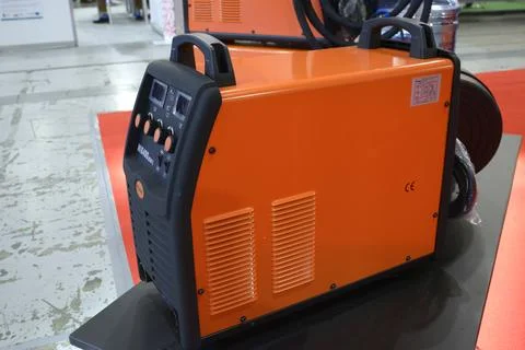 Modern welding machine Jasic presented on stand. Industry exhibition Stock Photos