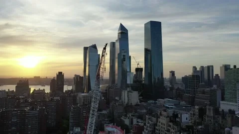 Modern West Side tower cluster reflects a low golden sunset Stock-Footage 131006114