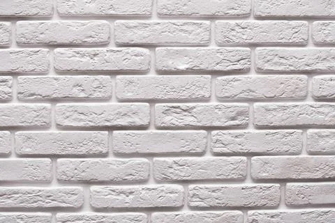 Modern white brick wall texture for background with copy space. Stock Photos