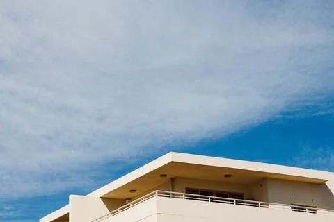 Modern White Building Against A Clear Blue Sky On A Sunny Day Stock Photos