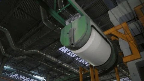 Modern white cable transporter turns on green rails closeup Stock-Footage 124003311