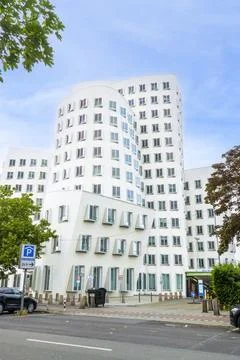 Modern white deconstructivist architecture of the Neuer Zollhof building by.. Stock Photos