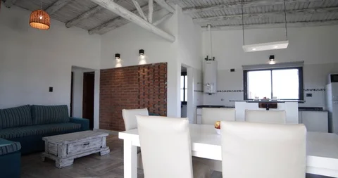 Modern white  dinning room, kitchen and living. Vidéo 98017993