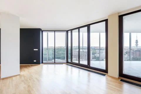 Modern white empty loft apartment interior with parquet floor with black colu Stock Photos