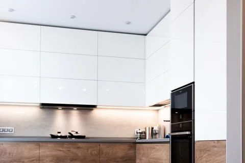 Modern white kitchen clean interior design. Home cooking Photos