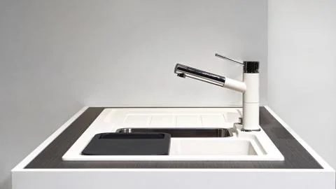 Modern white kitchen sink Stock Photos