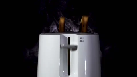  Modern white kitchen toaster in work. Hot toasts for breakfast. Slow motion Video stock 124943994