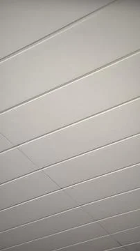 Modern White Slatted Ceiling with Linear Design. Stock Photos